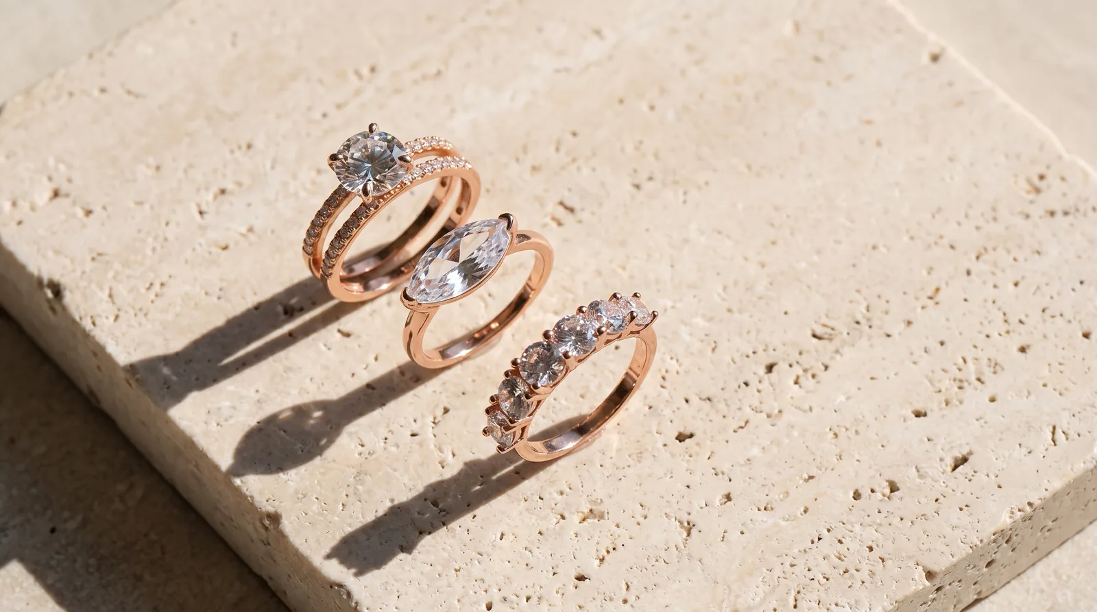 Three diamond rings on a stone slab